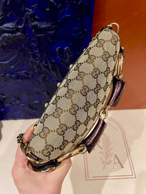 Sold Gucci Horsebit 1955 Chain Bag Gucci Monogram Iridescent Purple Leather and Gold Studs