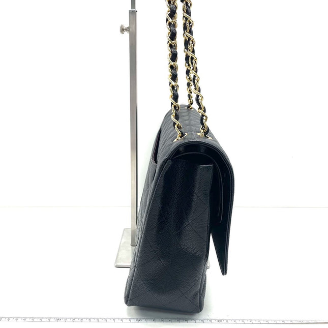 Sold Chanel Classic Flap Maxi Black Caviar Leather Double Flap with Gold Hardware, 2014-2015