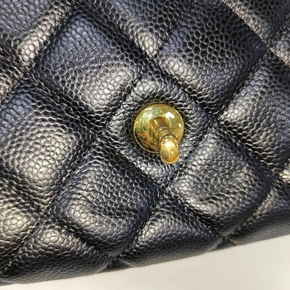 Sold Chanel Classic Flap Maxi 2009 Black Caviar Leather Single Flap with Gold Hardware