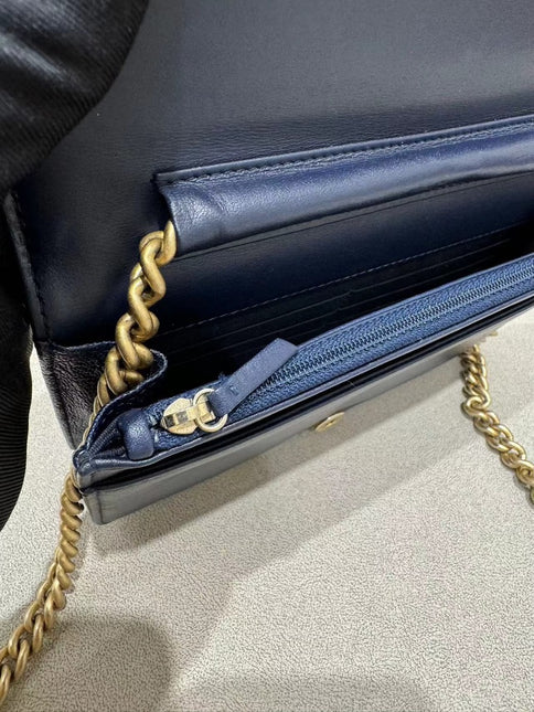 Sold Chanel Wallet on Chain WOC Boy Navy Caviar Leather with Antiqued Gold Hardware