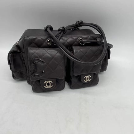 Sac Reporter Ligne Cambon Chanel en cuir de veau noir multipoches taille moyenne