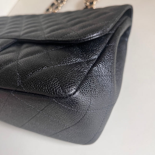 Sold Chanel Classic Flap 2009 Jumbo Black Caviar Leather Single Flap with Gold Hardware