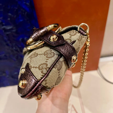 Sold Gucci Horsebit 1955 Chain Bag Gucci Monogram Iridescent Purple Leather and Gold Studs