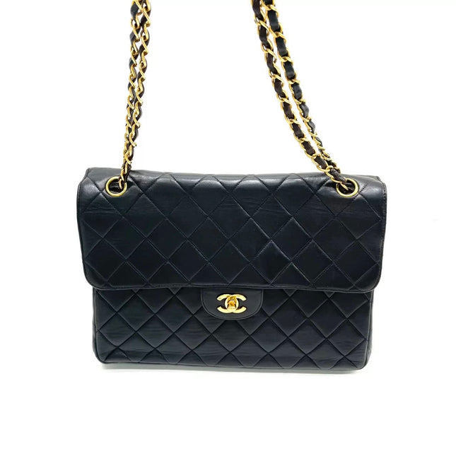 Chanel Jumbo Double Sided Classic Flap Black Lambskin Leather 24k Gold Hardware Handbag