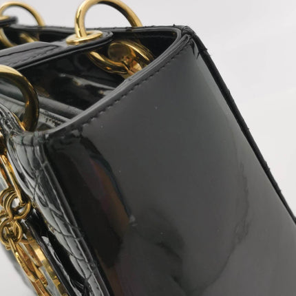 Sold Lady Dior Medium Black Patent Leather Handbag with Gold Hardware