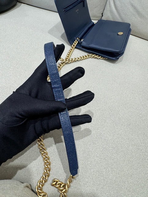 Sold Chanel Wallet on Chain WOC Boy Navy Caviar Leather with Antiqued Gold Hardware