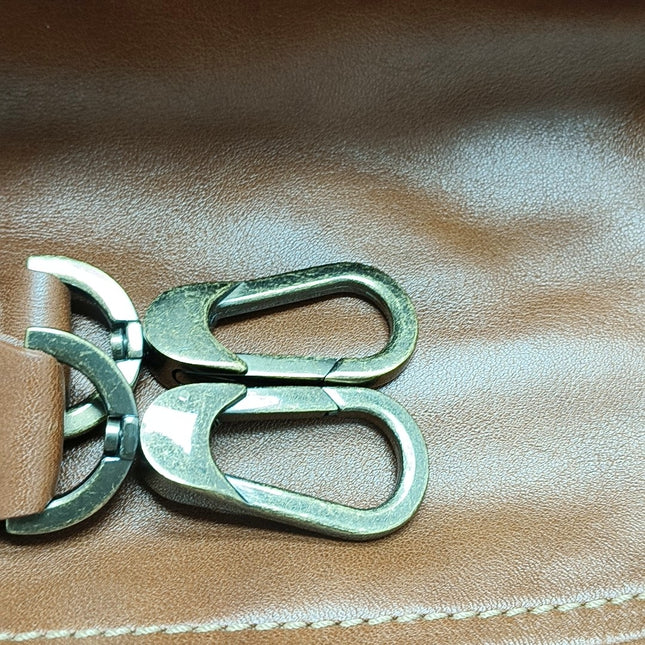 Sac de voyage Longchamp Au Sultan en cuir marron avec poignée et bandoulière en toile