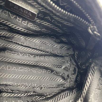 Prada Leopard Print Pony-style Calfskin Mini Clutch