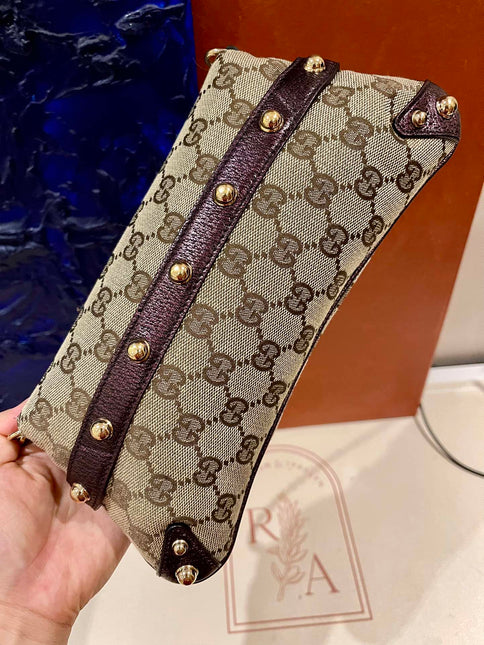 Sold Gucci Horsebit 1955 Chain Bag Gucci Monogram Iridescent Purple Leather and Gold Studs