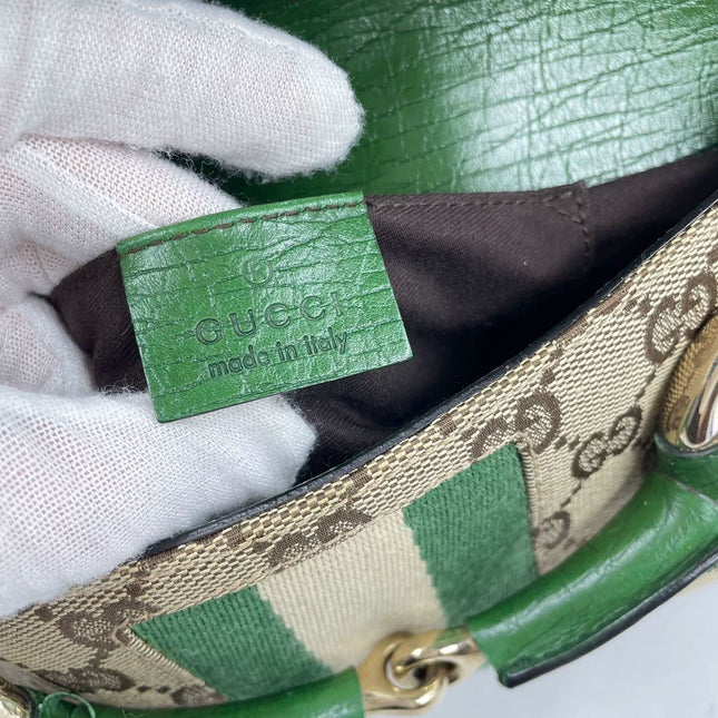 Sold Iconic Gucci Horsebit 1955 Chain Cloth Gucci Monogram Green Leather and Gold Studs