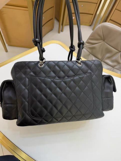 Chanel Cambon Multi-pocket Ligne Reporter Bag Large Black Calfskin Leather White Logo