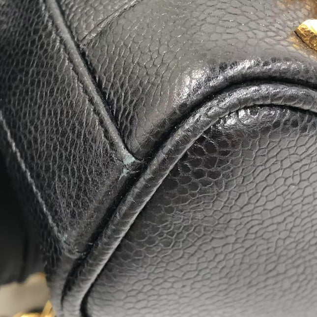 Chanel Vintage Mini Bucket Bag Black Caviar Leather Gold Logo, 1996-1997