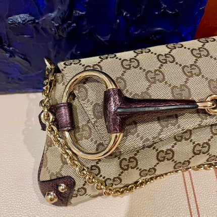 Sold Gucci Horsebit 1955 Chain Bag Gucci Monogram Iridescent Purple Leather and Gold Studs