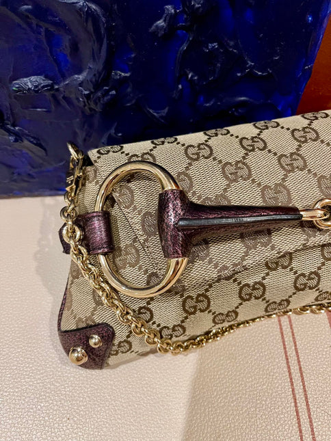 Sold Gucci Horsebit 1955 Chain Bag Gucci Monogram Iridescent Purple Leather and Gold Studs