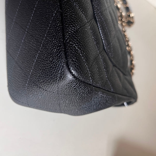Sold Chanel Classic Flap 2009 Jumbo Black Caviar Leather Single Flap with Gold Hardware