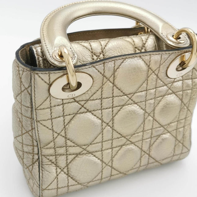 Sold Lady Dior Mini Supple Calfskin Leather Gold Cannage Handbag with Strap