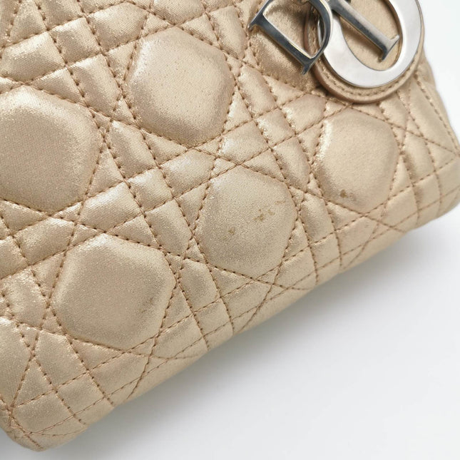 Sold Lady Dior Mini Gold Textile Cannage handbag with strap