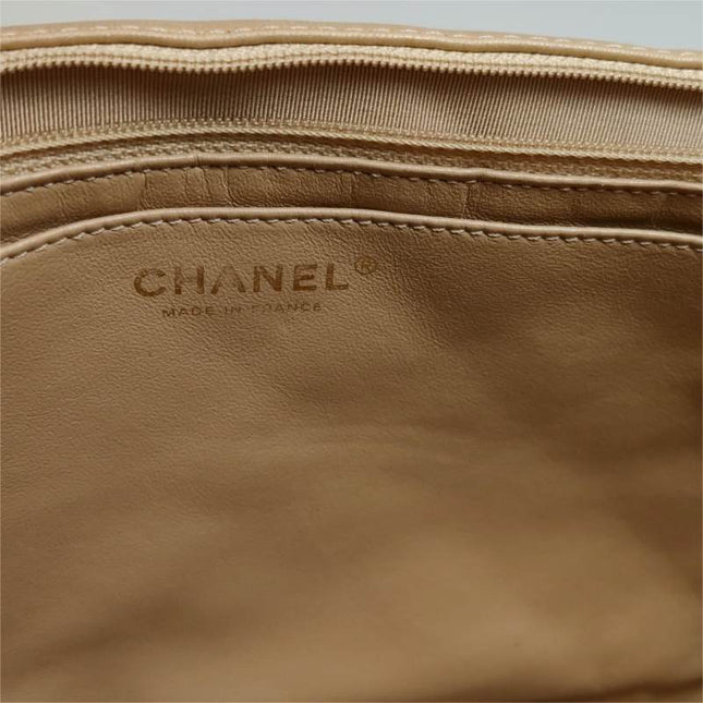 Chanel Classic Flap Maxi Beige Latte Lambskin Leather Giant Gold-tone CC Logo