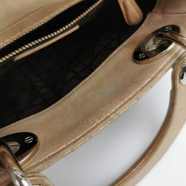 Sold Lady Dior Mini Gold Textile Cannage handbag with strap
