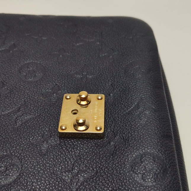 Louis Vuitton Pochette Métis Monogram Empreinte Leather Navy