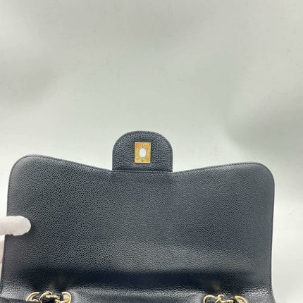 Sold Chanel Classic Flap 2009 Jumbo Black Caviar Leather Single Flap with Gold Hardware