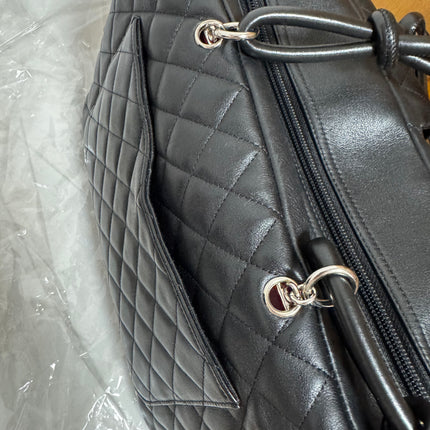 Chanel Cambon Multi-pocket Ligne Reporter Bag Large Black Calfskin Leather White Logo