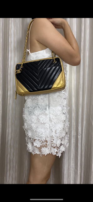 Sold Chanel Chevron Black and Gold Shoulder Bag