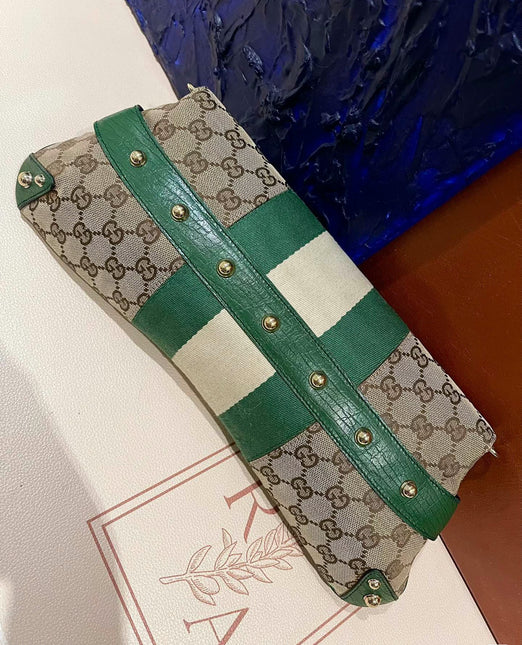 Sold Iconic Gucci Horsebit 1955 Chain Cloth Gucci Monogram Green Leather and Gold Studs
