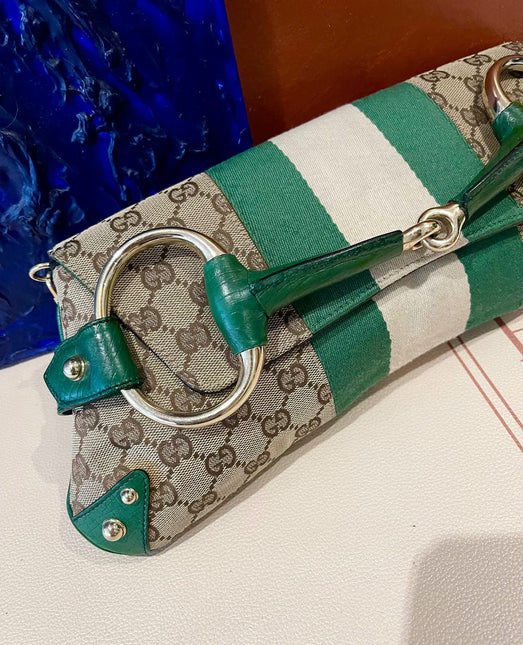 Sold Iconic Gucci Horsebit 1955 Chain Cloth Gucci Monogram Green Leather and Gold Studs