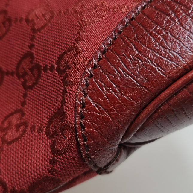 Gucci Jackie Vintage Medium Red Monogram Canvas and Leather Silver Hardware Shoulder Bag