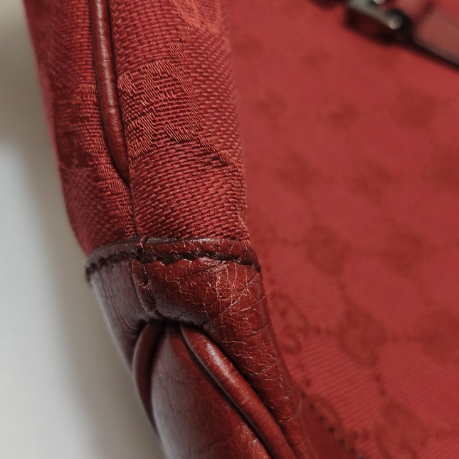 Gucci Jackie Vintage Medium Red Monogram Canvas and Leather Silver Hardware Shoulder Bag