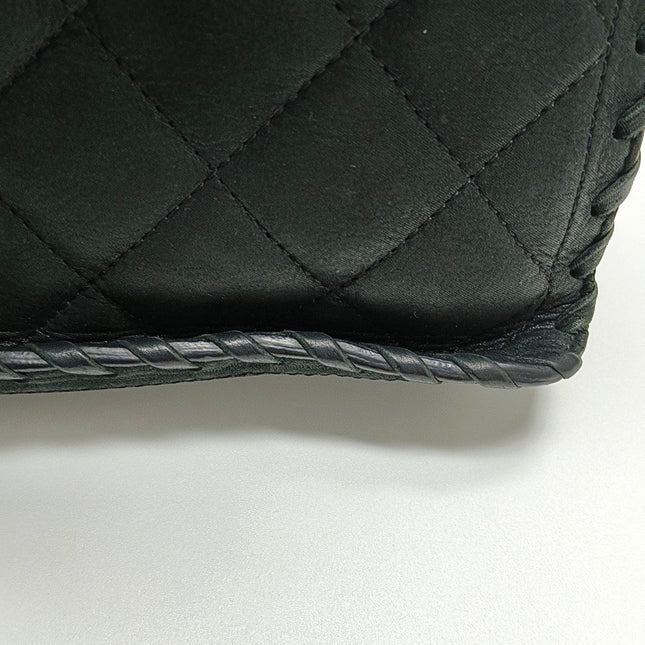 Chanel Classic Flap Medium Black Aged Calfskin Leather Braided Edge Gold Hardware