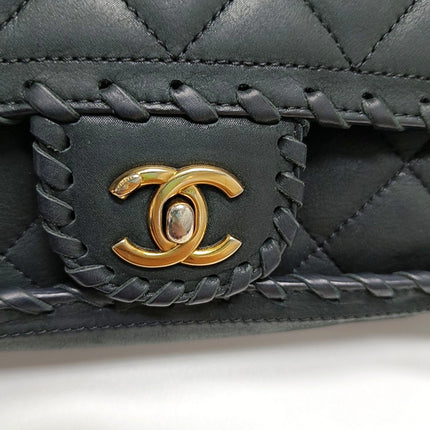 Chanel Classic Flap Medium Black Aged Calfskin Leather Braided Edge Gold Hardware