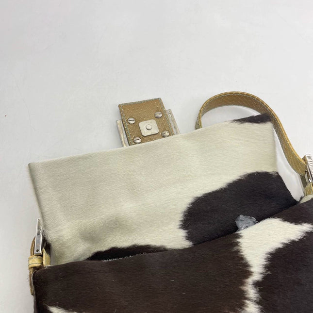 Sold Fendi Baguette Pony hair in cow print White with Python Skin Strap and Buckle