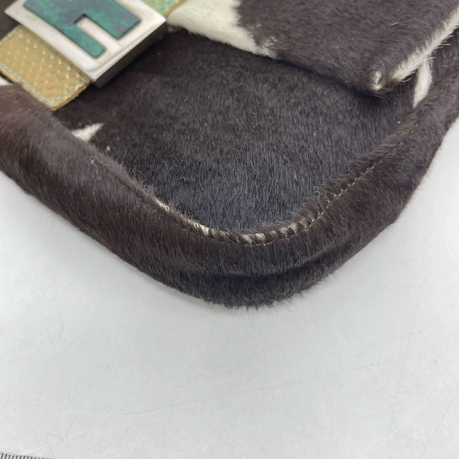 Sold Fendi Baguette Pony hair in cow print White with Python Skin Strap and Buckle