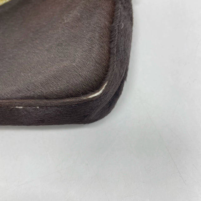 Sold Fendi Baguette Pony hair in cow print White with Python Skin Strap and Buckle