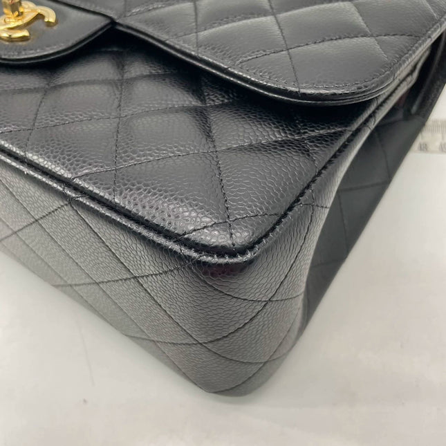 Sold Chanel Classic Flap Jumbo Black Caviar Leather Double Flap with Gold Hardware