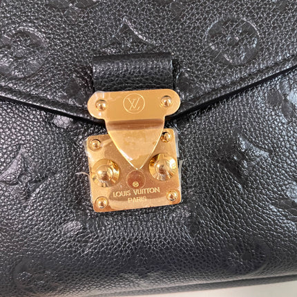 Sold Louis Vuitton Pochette Métis Monogram Empreinte Leather Black