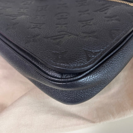 Sold Louis Vuitton Pochette Métis Monogram Empreinte Leather Black