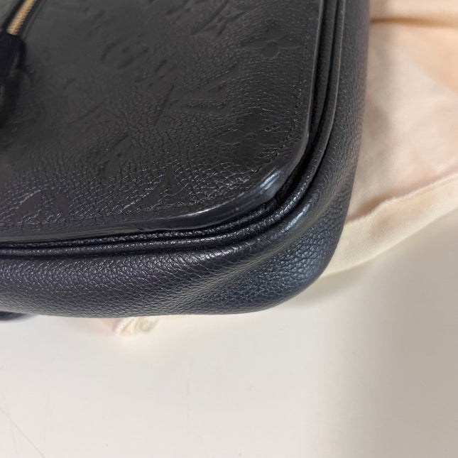 Sold Louis Vuitton Pochette Métis Monogram Empreinte Leather Black
