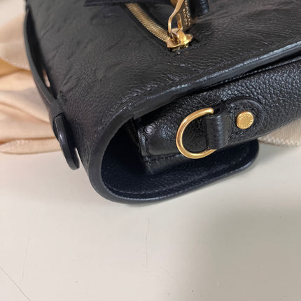 Sold Louis Vuitton Pochette Métis Monogram Empreinte Leather Black