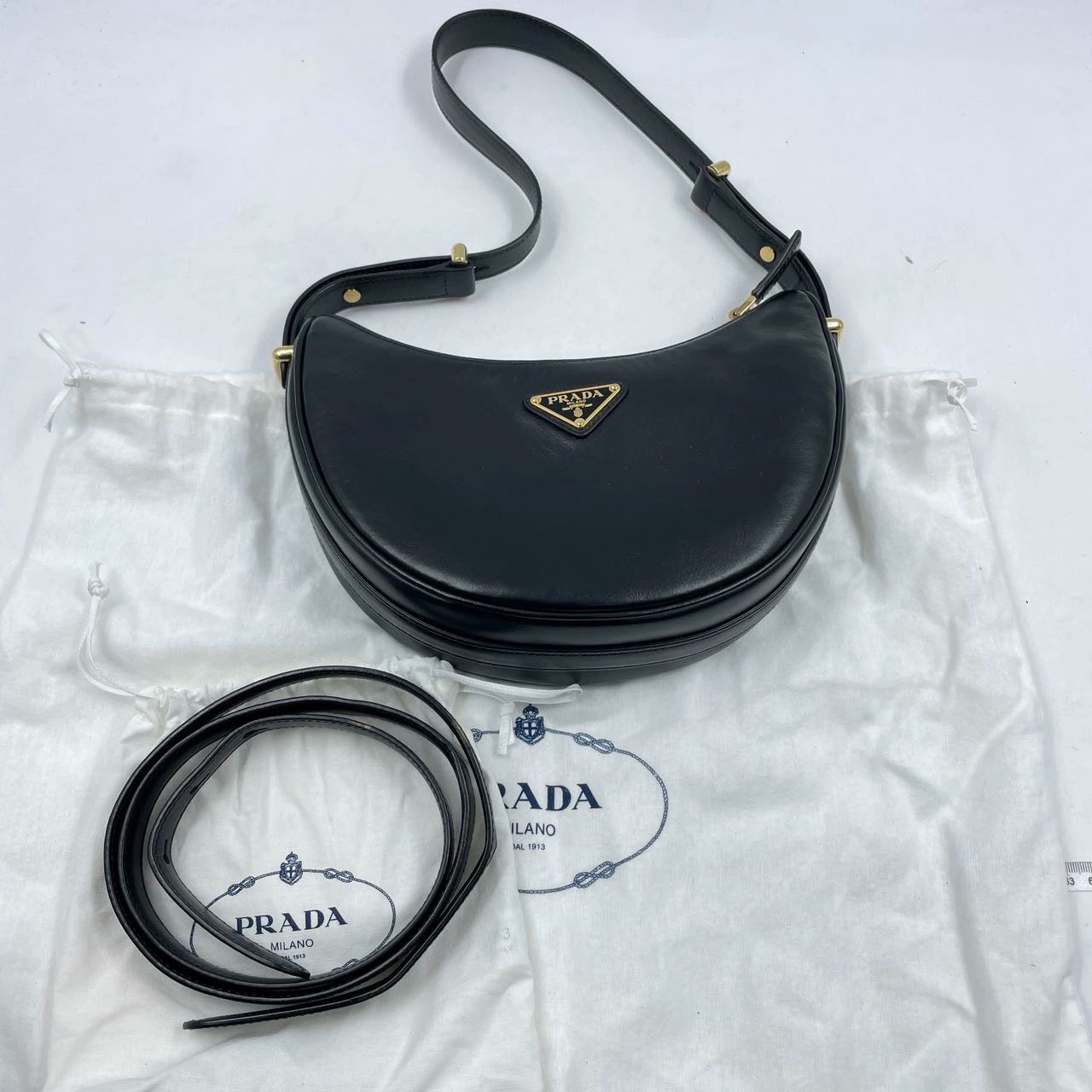 Prada Arqué black calfskin leather shoulder bag Crescent Moon Shape