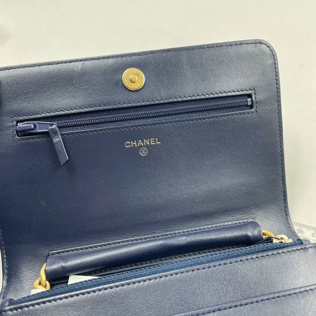 Sold Chanel Wallet on Chain WOC Boy Navy Caviar Leather with Antiqued Gold Hardware
