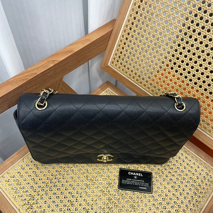 Chanel Classic Flap Maxi 2011 Black Caviar Leather Double Flap Gold Hardware