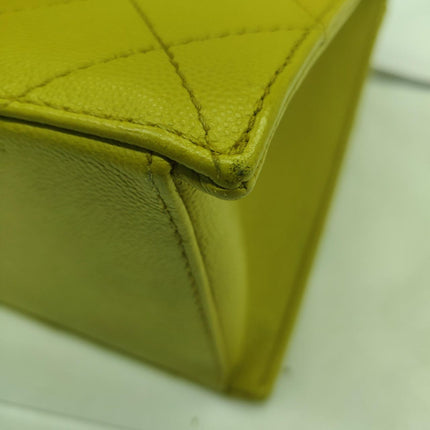 Sac à rabat Chanel Vintage Kelly en cuir caviar jaune et finitions dorées 24 carats 1997-1999