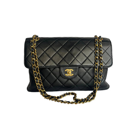 Chanel Jumbo Double Sided Classic Flap Black Lambskin Leather 24k Gold Hardware Handbag