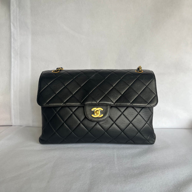 Chanel Jumbo Double Sided Classic Flap Black Lambskin Leather 24k Gold Hardware Handbag