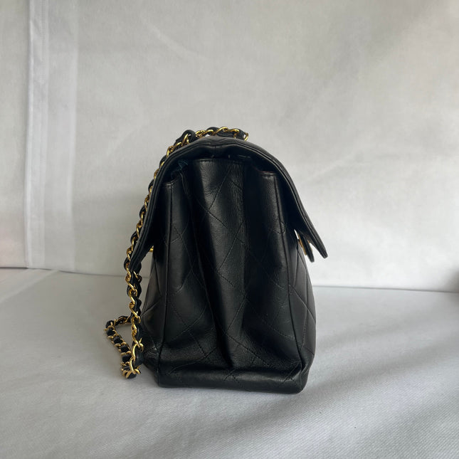 Chanel Jumbo Double Sided Classic Flap Black Lambskin Leather 24k Gold Hardware Handbag