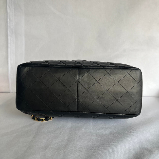 Chanel Jumbo Double Sided Classic Flap Black Lambskin Leather 24k Gold Hardware Handbag