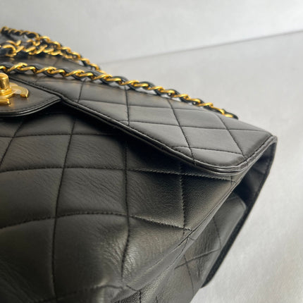 Chanel Jumbo Double Sided Classic Flap Black Lambskin Leather 24k Gold Hardware Handbag